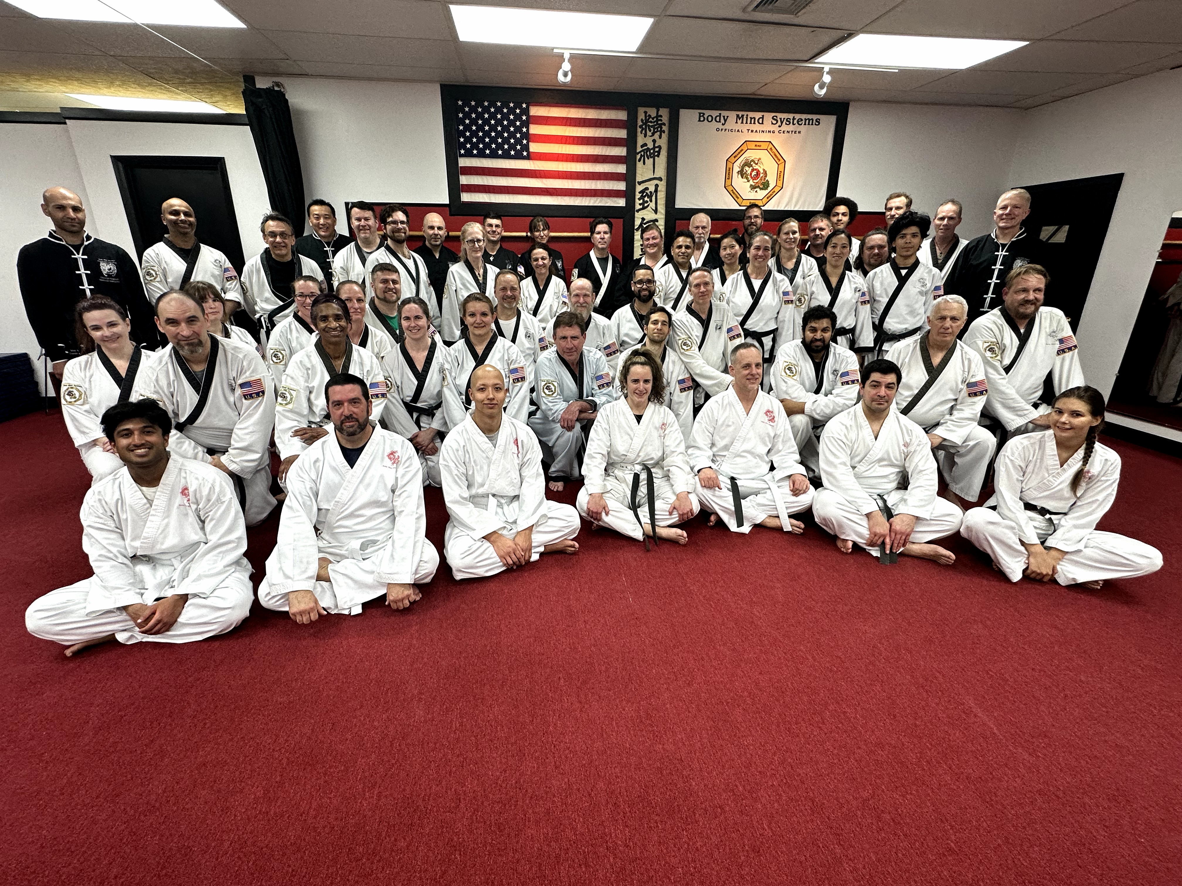 Instructor performing a sword form at Body Mind Systems